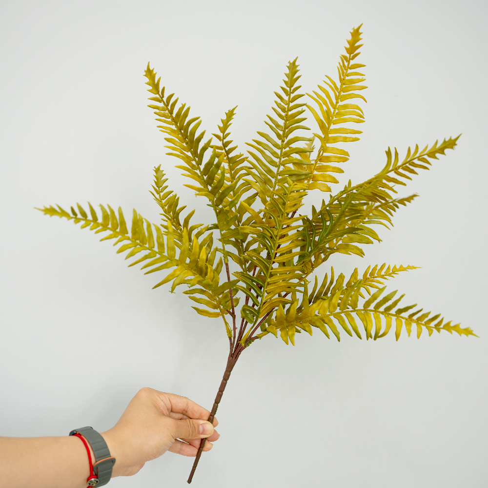 Artificial autumn fern leaves