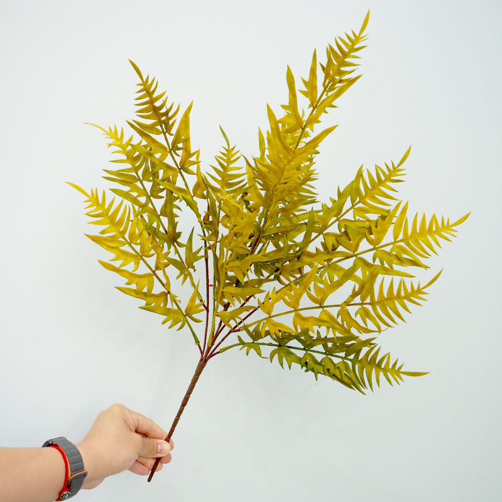Artificial autumn fern leaves