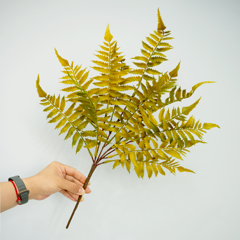 Artificial autumn fern leaves
